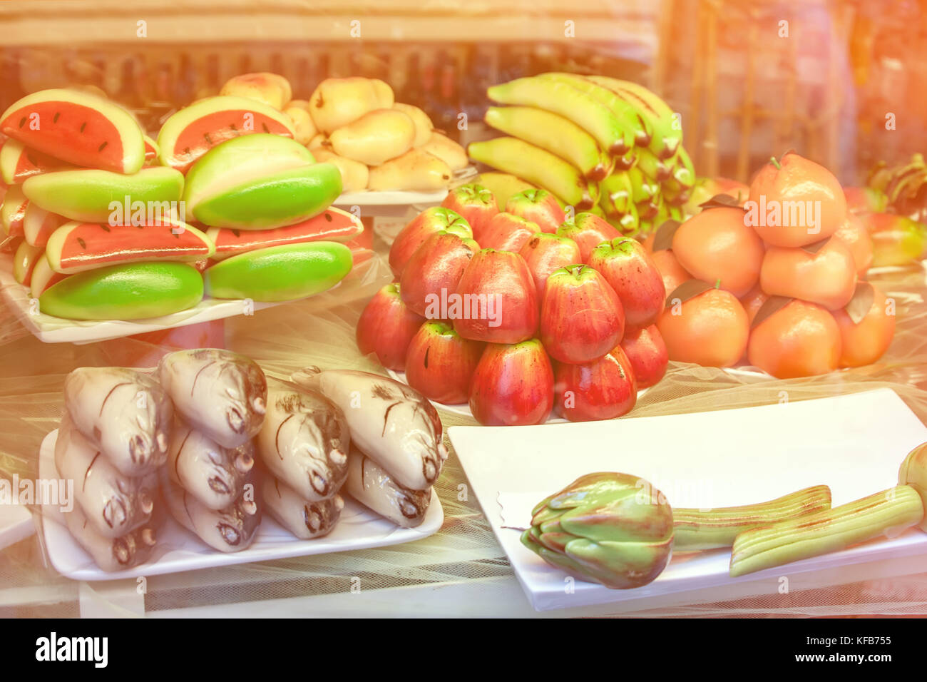 Pastry with marzipan in the form of fruit and fish. Typical Sicilian. The horizontal frame. Stock Photo