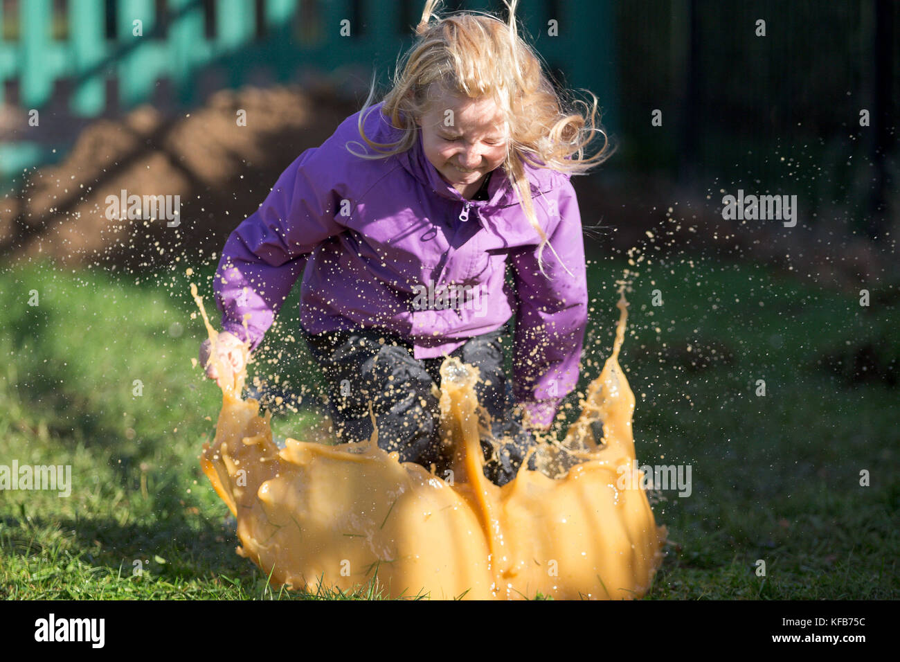 The World Puddle Jumping Championships at Wicksteed Park in Northamptonshire on Wednesday October 25th.  Youngsters have been making a splash at the World Puddle Jumping Championships at Wicksteed Park in Northamptonshire today (Wed).  Competitors battled it out to make the biggest splash at the fifth annual contest in Kettering.  Organisers created a special series of championship-standard puddles and judges gave scores based on things such as height of jump, enthusiasm, distance of splash and stickability (the amount of mud which clings to each competitor). Stock Photo