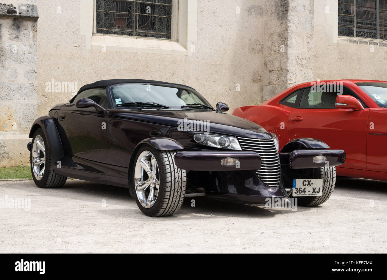 Plymouth Prowler car by DaimlerChrysler, outside a church in France, Europe Stock Photo