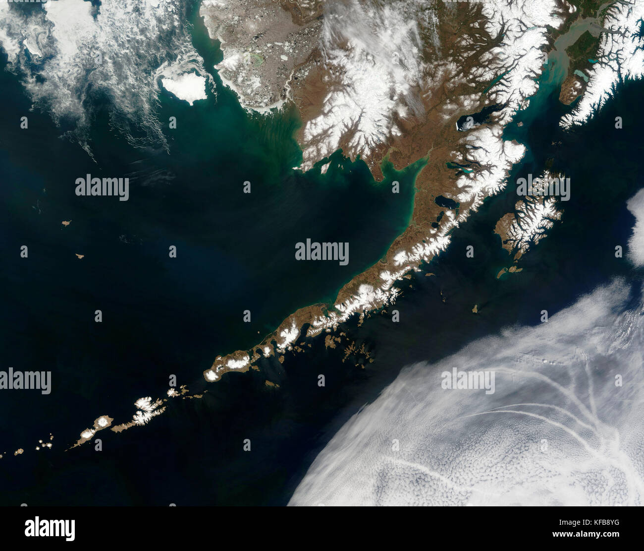 The Aleutian Islands and the Alaskan peninsula are shown in this image acquired on May 25th, 2006. Stock Photo