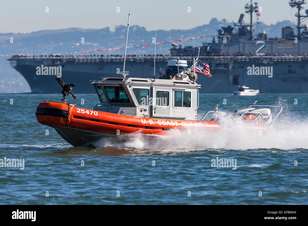 A Coast Guard MSST in a Defender-class boat, aka Response Boat – Small (RB-S), enroute to their patrol position on San Francisco Bay during 2017 Fleet Stock Photo