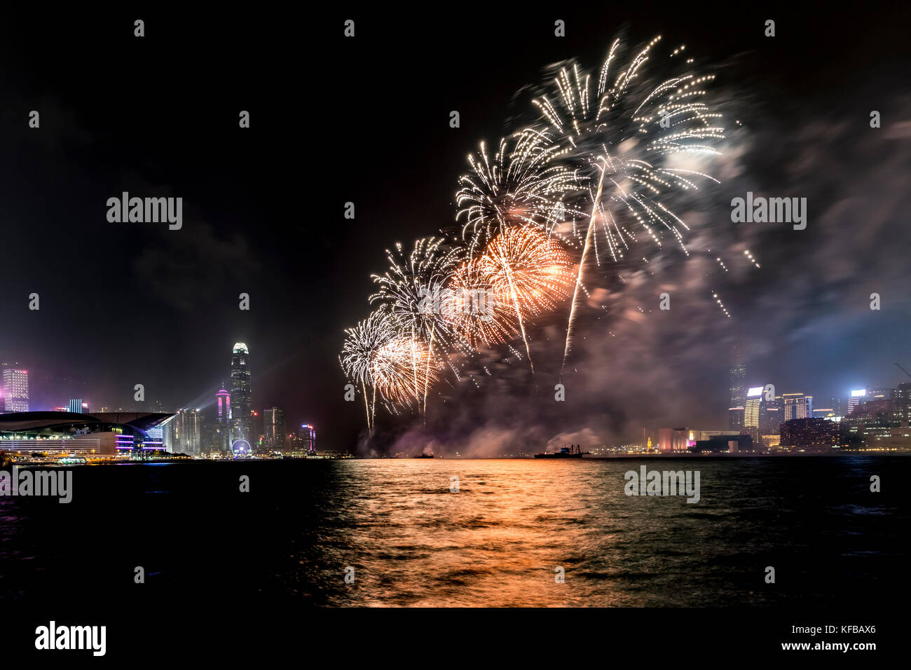 Fireworks display at Victoria harbor of Hong Kong Stock Photo