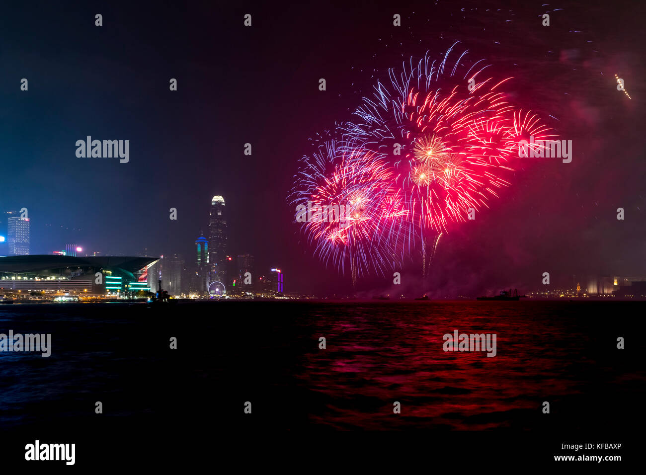 Fireworks display at Victoria harbor of Hong Kong Stock Photo