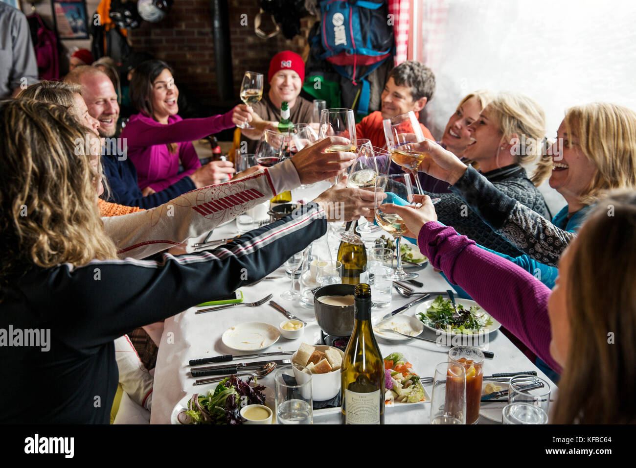 USA, Colorado, Aspen, skiers have lunch and wine at the Cloud Nine Restaurant, Aspen Highlands Ski Resort Stock Photo