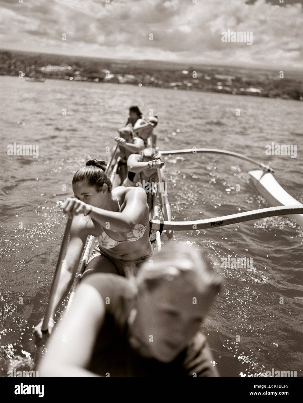 USA, Hawaii, The Big Island, Hilo, women row an Outrigger Canoe in Hilo Bay (B&W) Stock Photo