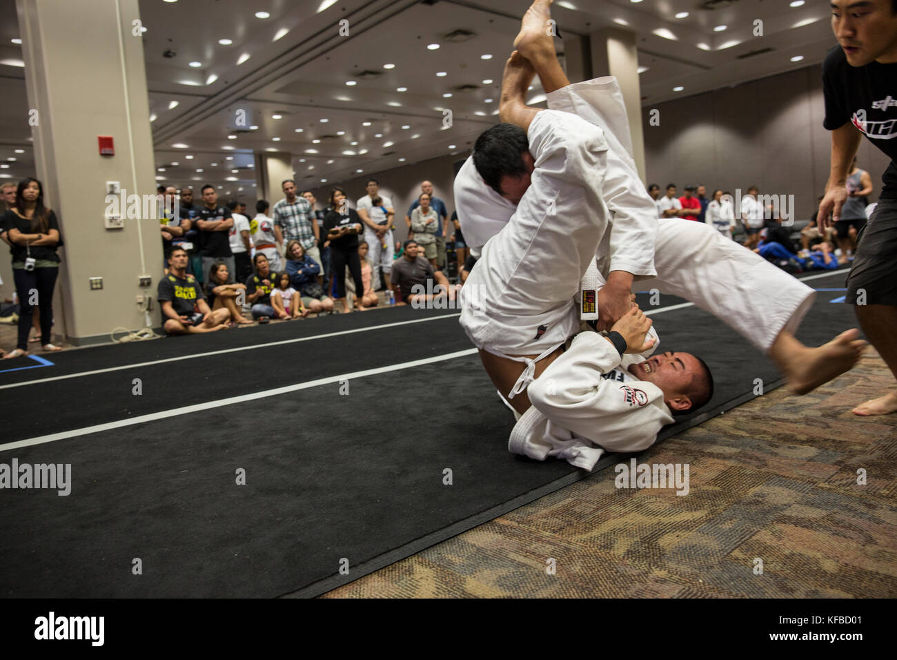 USA, Oahu, Hawaii, Jujitsu Martial Arts fighter Keith Chang grapples