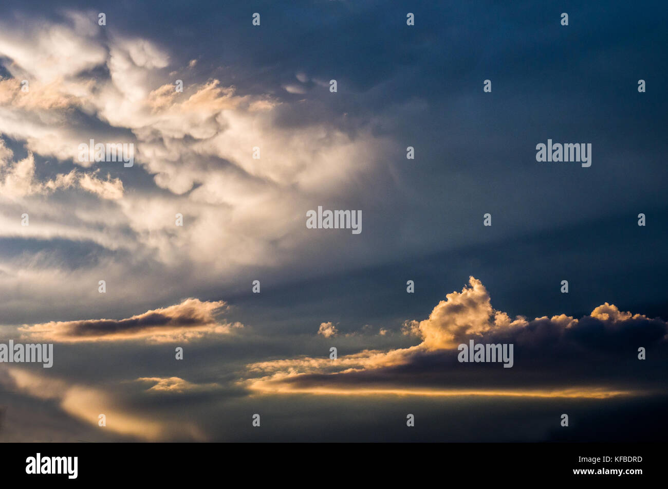 Dramatic sunset sky with colorful clouds after thunderstorm Stock Photo ...