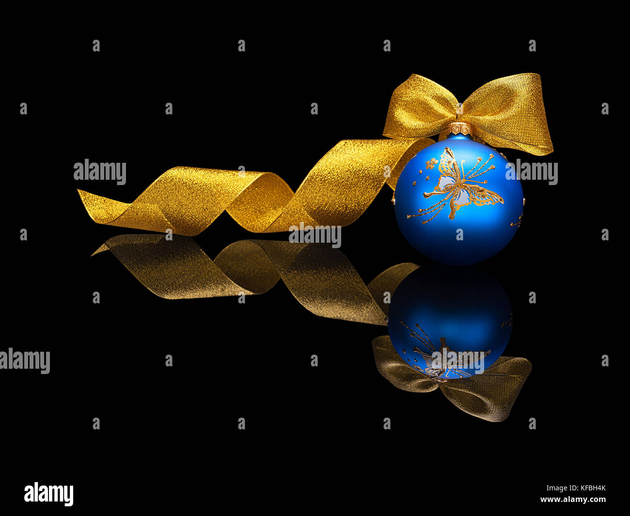 One blue Christmas ball decorations with gold ribbon and bow isolated ...