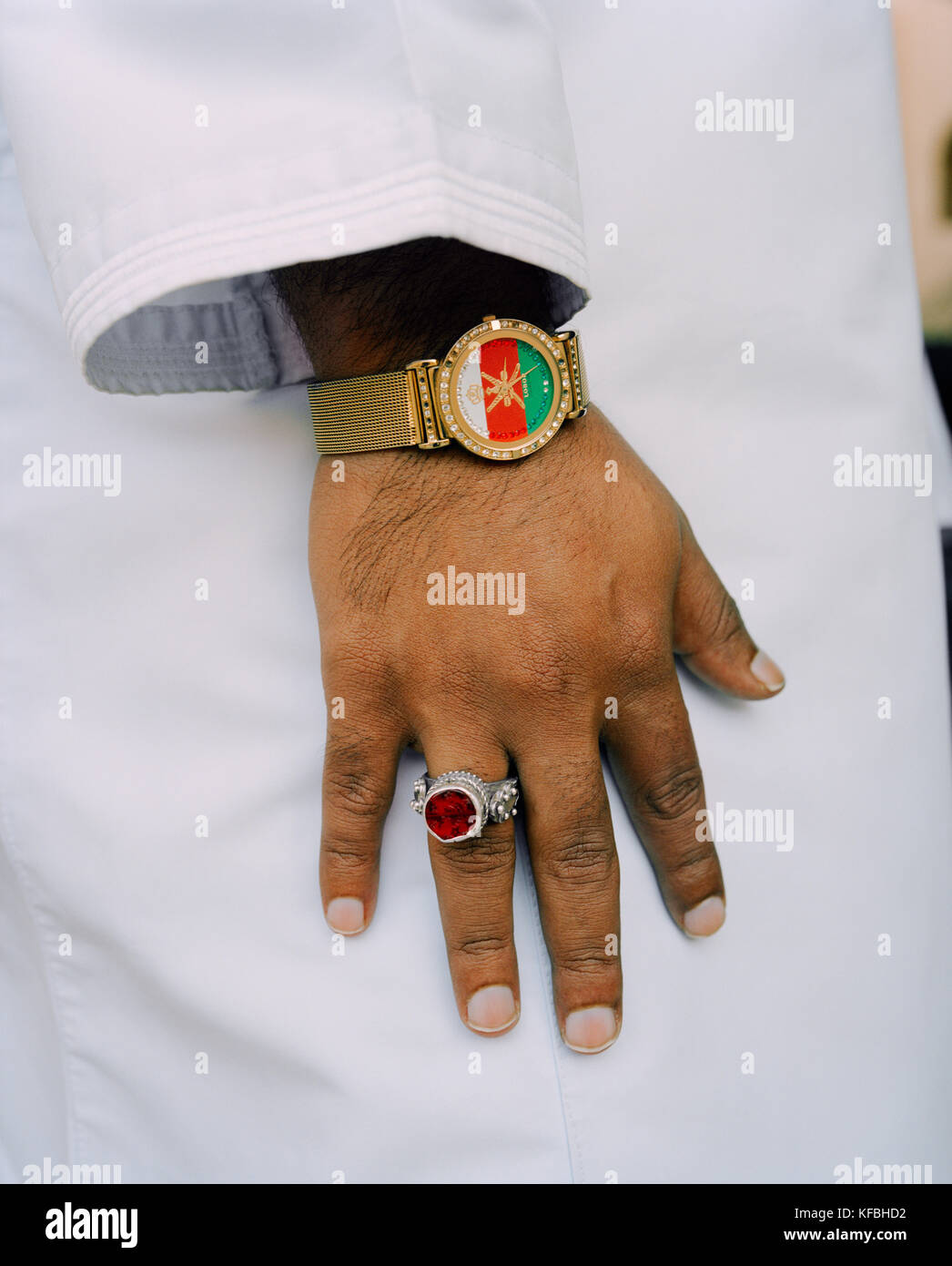 OMAN, Muscat, man wearing wristwatch and finger ring, Omani flag designed  on watch dial Stock Photo - Alamy