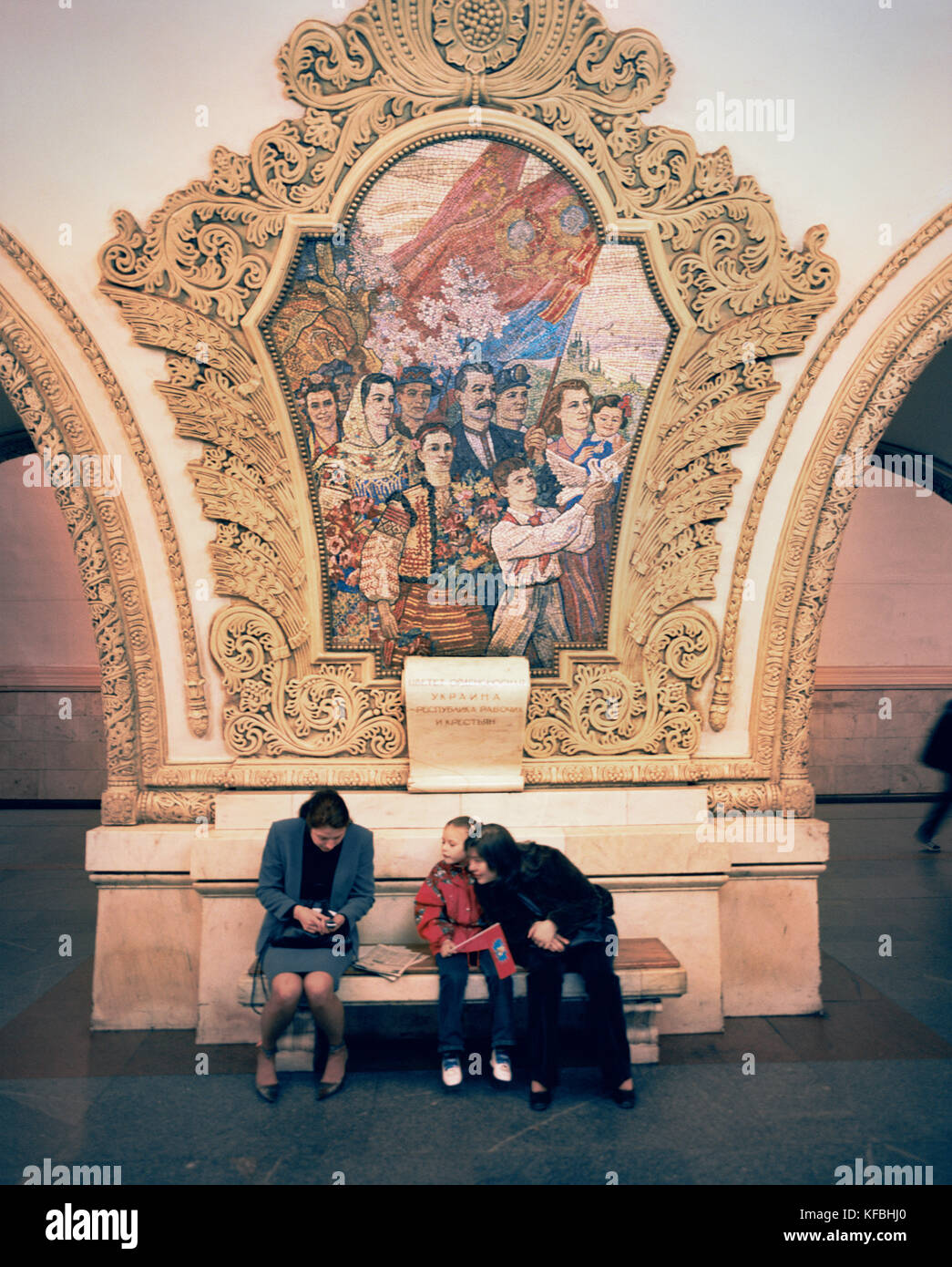 RUSSIA, Moscow, mid adult women with girl waiting at metro station Stock Photo