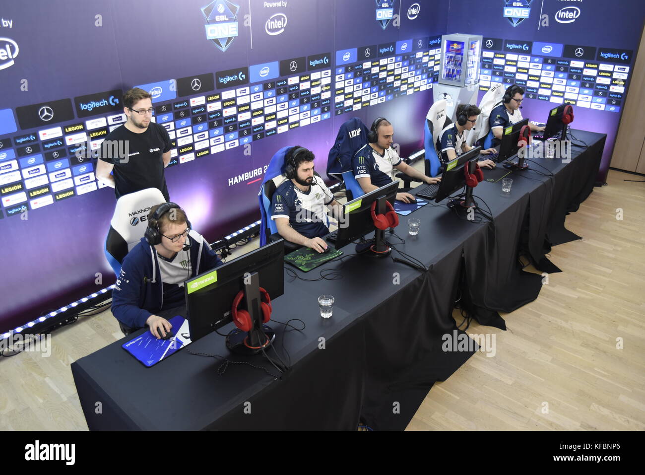 The players of Team Liquid, Lasse Urpalainen (l-r), Maroun Merhej, Kuro Salehi Takhasomi, Amer Al-Barkawi and Ivan Borislavov, sit in front of computers during the preliminary round of the e-sports event ESL One at a hotel in Hamburg, Germany, 26 October 2017. The first matches are carried out at the hotel, before the event continues on 28 October at the Barclaycard Arena with more than 10,000 expected audience members. Prize with a total worth of a Million US-Dollar can be won in the tournament. Photo: Marek Majewsky/dpa Stock Photo
