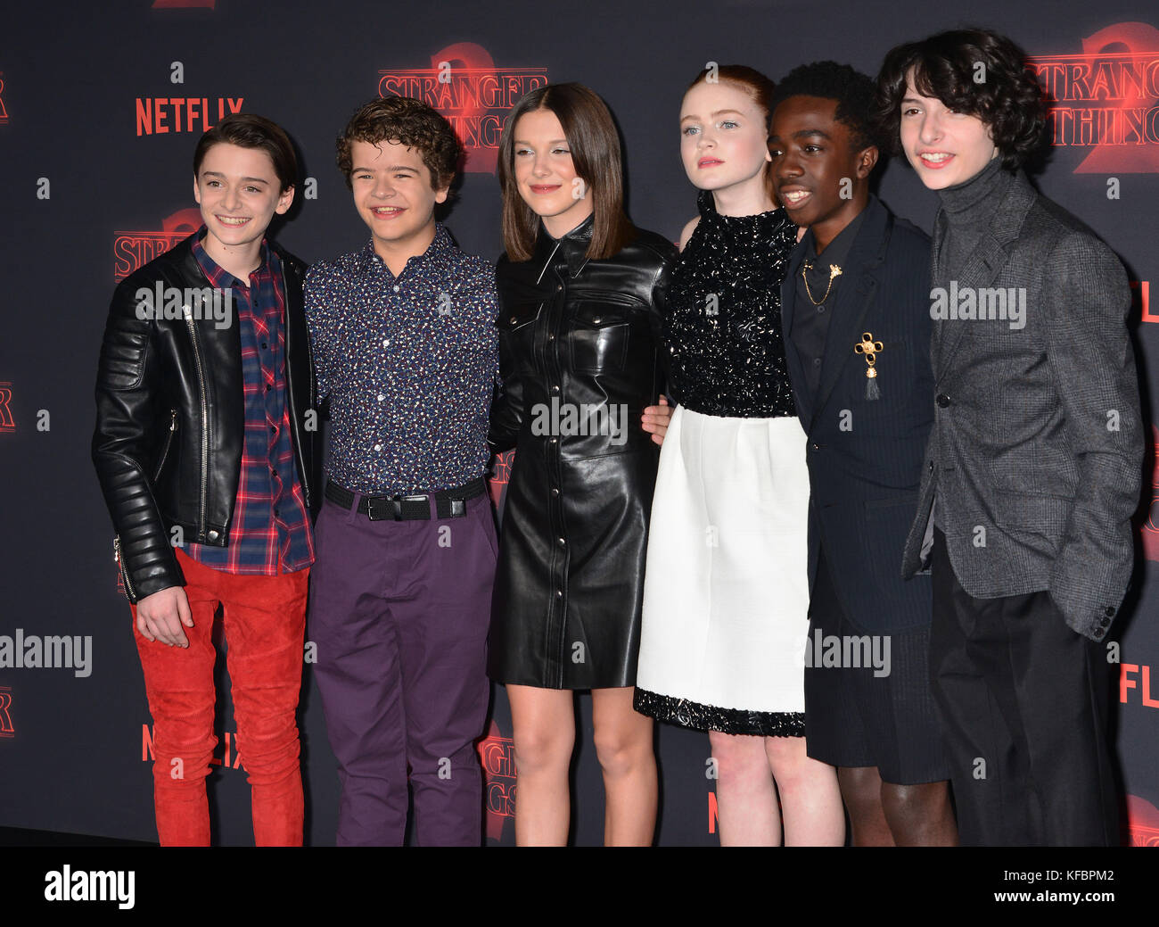 WESTWOOD, LOS ANGELES, CA, USA - OCTOBER 26: Actress Millie Bobby Brown  wearing a Calvin Klein dress arrives at the Los Angeles Premiere Of  Netflix's 'Stranger Things' Season 2 held at the