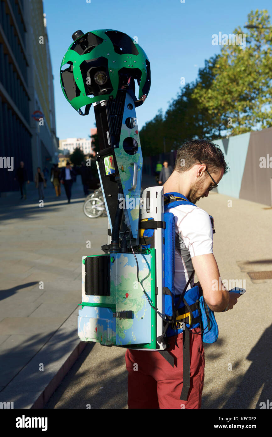 London, UK. 27th Oct, 2017. A Google tracker device, with recording equipment and cameras, is attached to the back of a Google representative, who is walking around the Kings Cross area, recording images, these will eventually be uploaded to Google maps / pictures. Google Street View Trakker, Google  Mapping. Google’s Trekker Camera Rig. Stock Photo