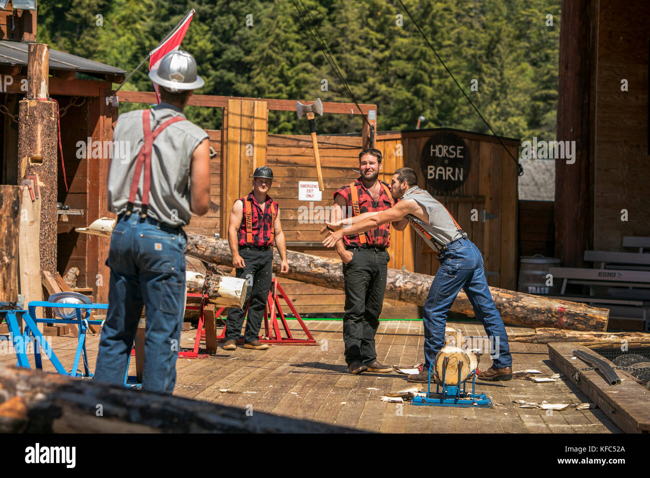 USA, Alaska, Ketchikan, a group of men compete during the Great Alaskan Lumberjack Show Stock