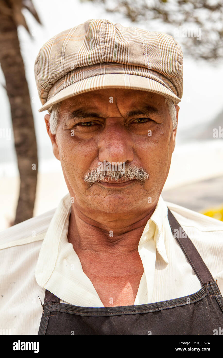 BRAZIL, Rio de Janiero, portrait of a man who sells pineapple at Sao Conrado Beach Stock Photo