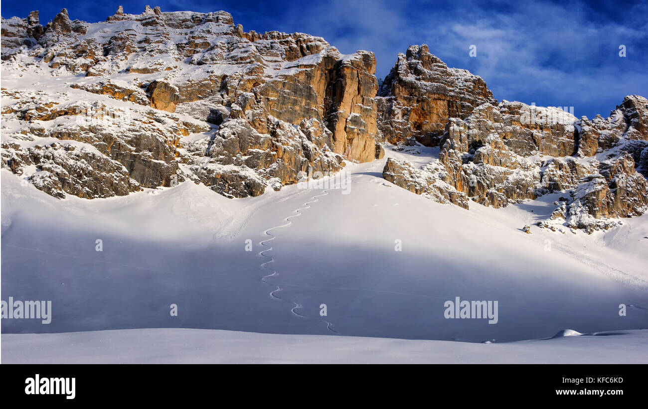 winter dolomites panorama with ski tracks in the snow Stock Photo