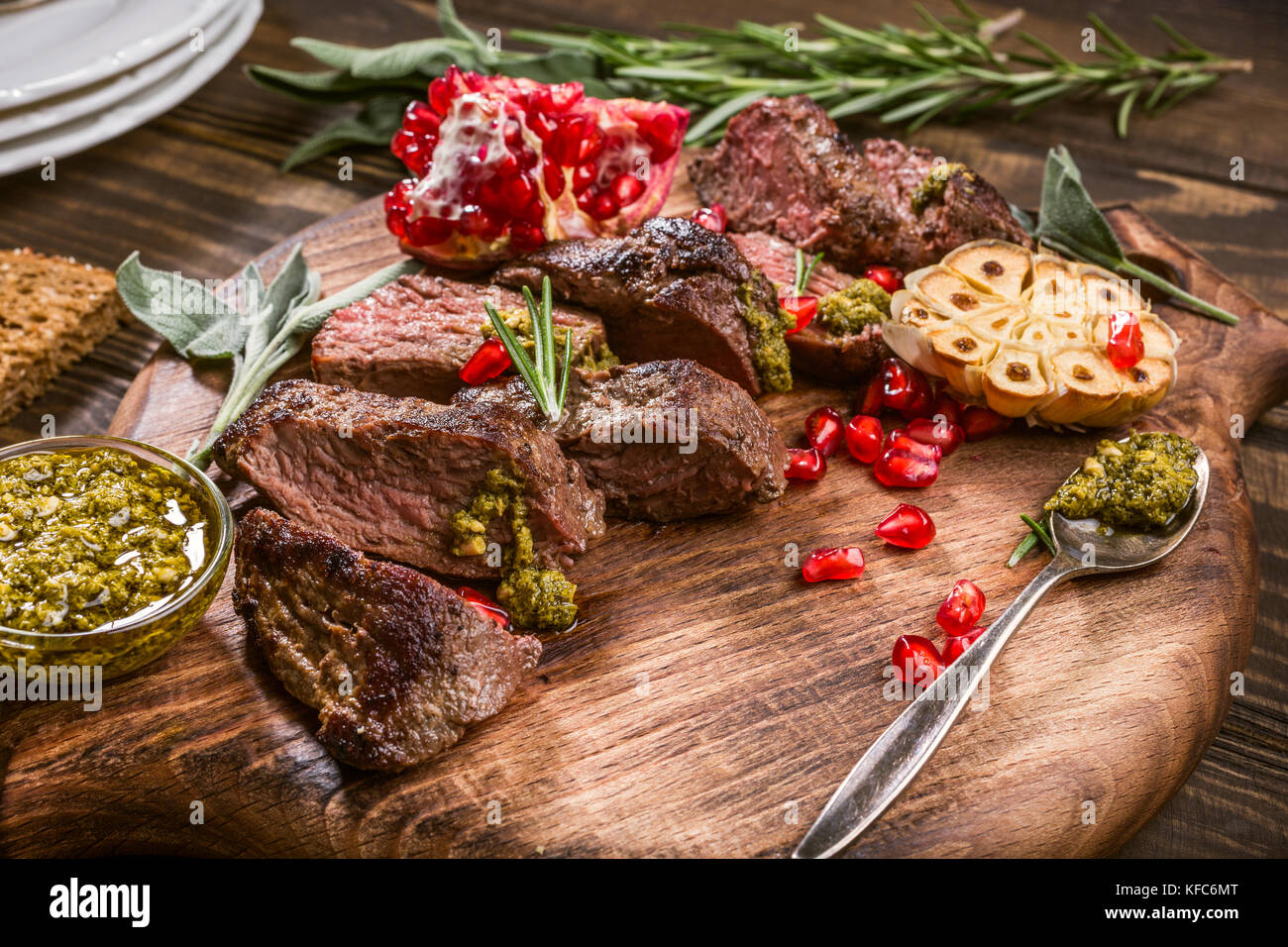 Meat steak with green pesto Stock Photo Alamy