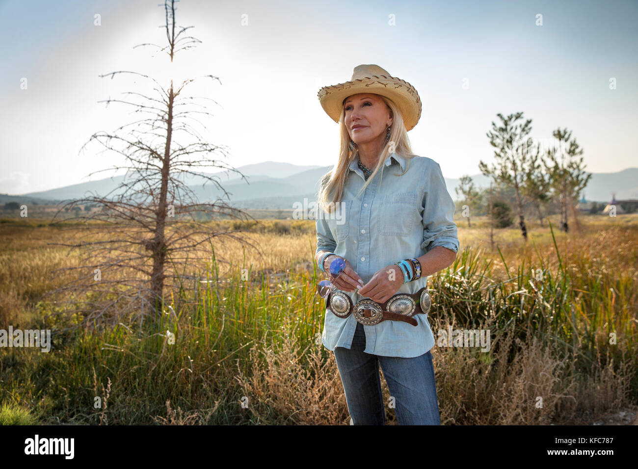 USA, Nevada, Wells, Founder Madeleine Pickens walks around the her 900