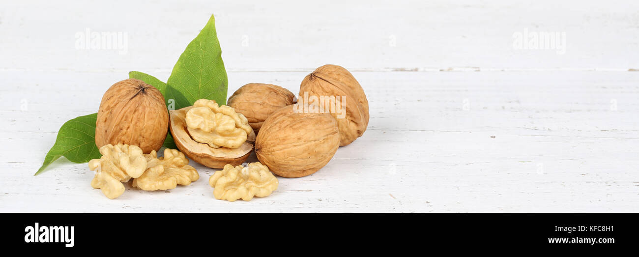 Walnuts walnut nuts banner copyspace on wooden board food Stock Photo