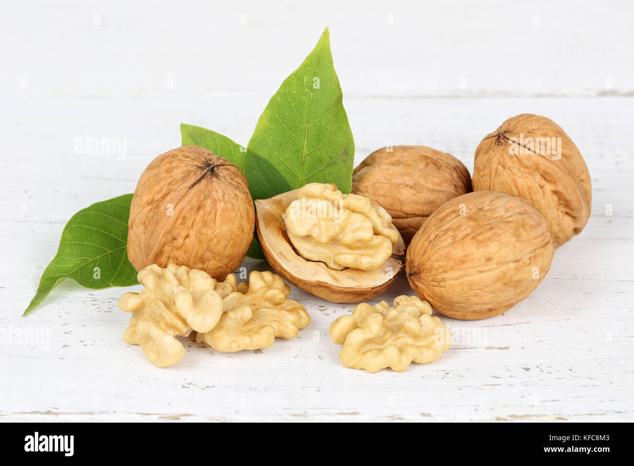Walnuts walnut nuts on wooden board food Stock Photo