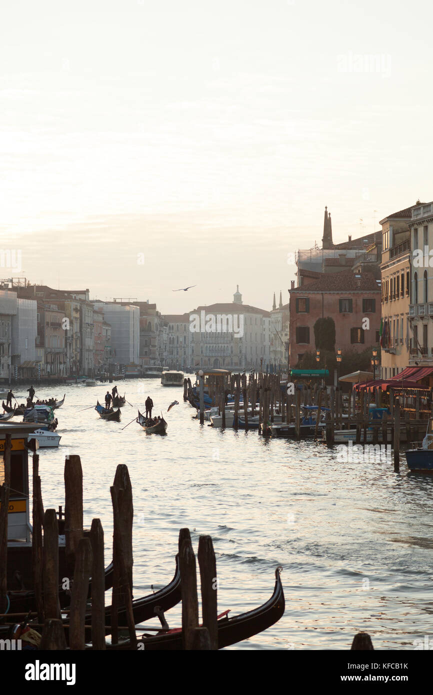 ITALY, Venice. View of the Grand Canal, Homes, Shops and Restaurants at sunset from the Rialto Bridge. Stock Photo