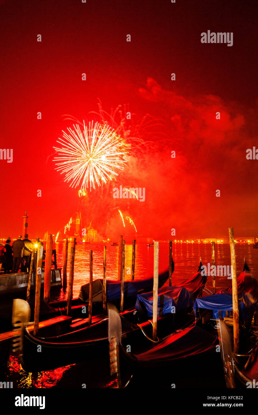 ITALY, Venice. New Year's Eve fireworks display over the Grand Canal and island of San