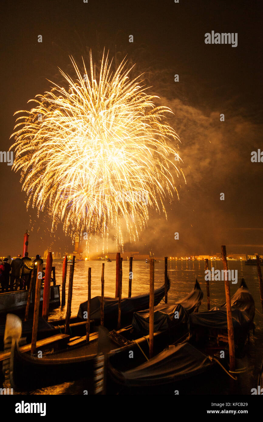 ITALY, Venice. New Year's Eve fireworks display over the Grand Canal and island of San