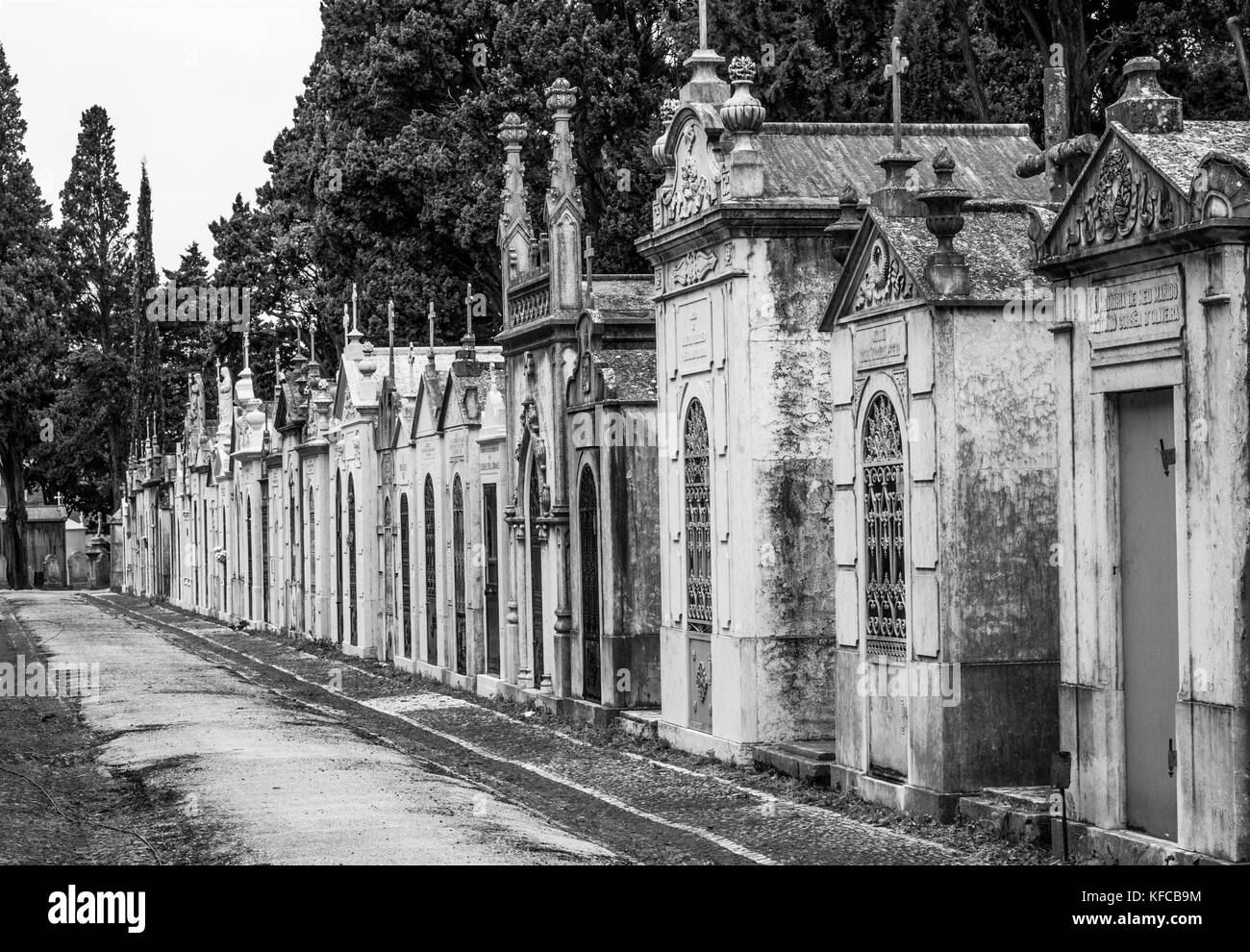 Tombs and tombstones in Prazeres Cemetery, Lisbon, Portugal. Prazeres is a former civil parish (freguesia) in the city and municipality of Lisbon. Stock Photo