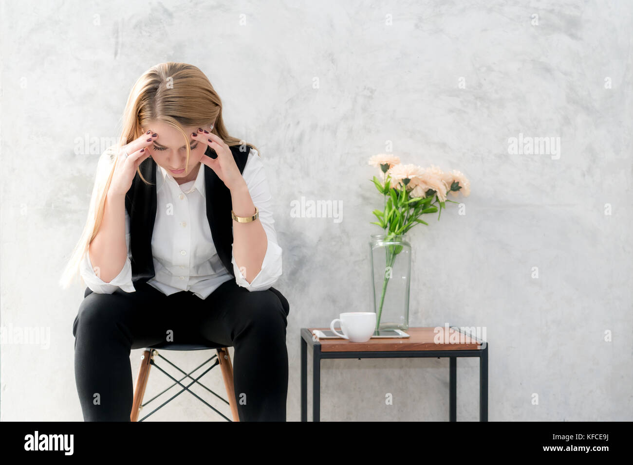 Portrait of tired young Asian business woman feeling stress from work. Stress at work and emotional pressure concept. Stock Photo