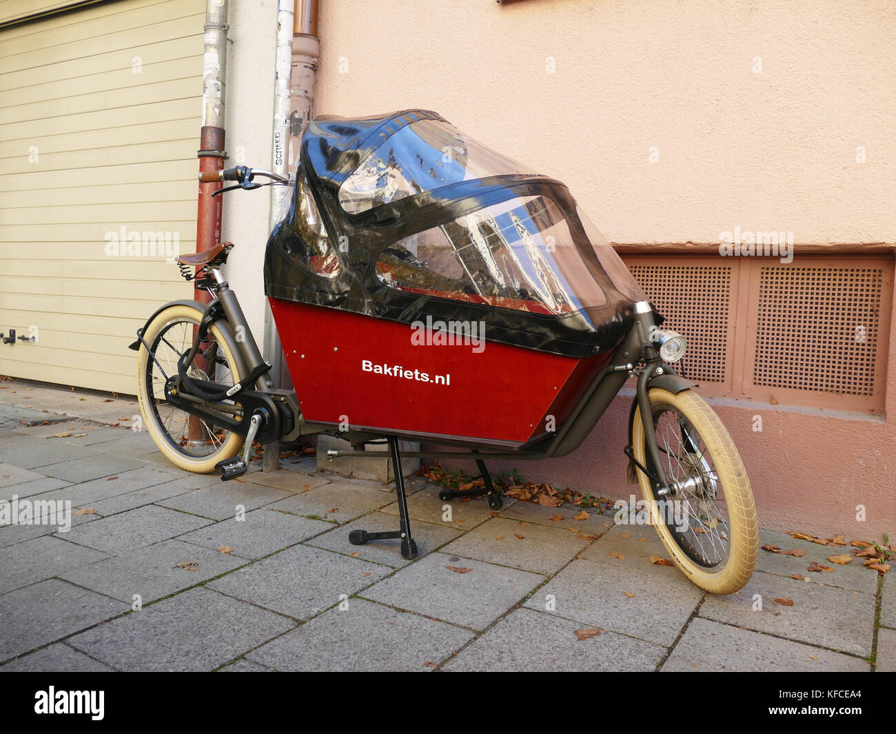 Bicycle with Baby Cabin wagon Germany Europe Stock Photo Alamy