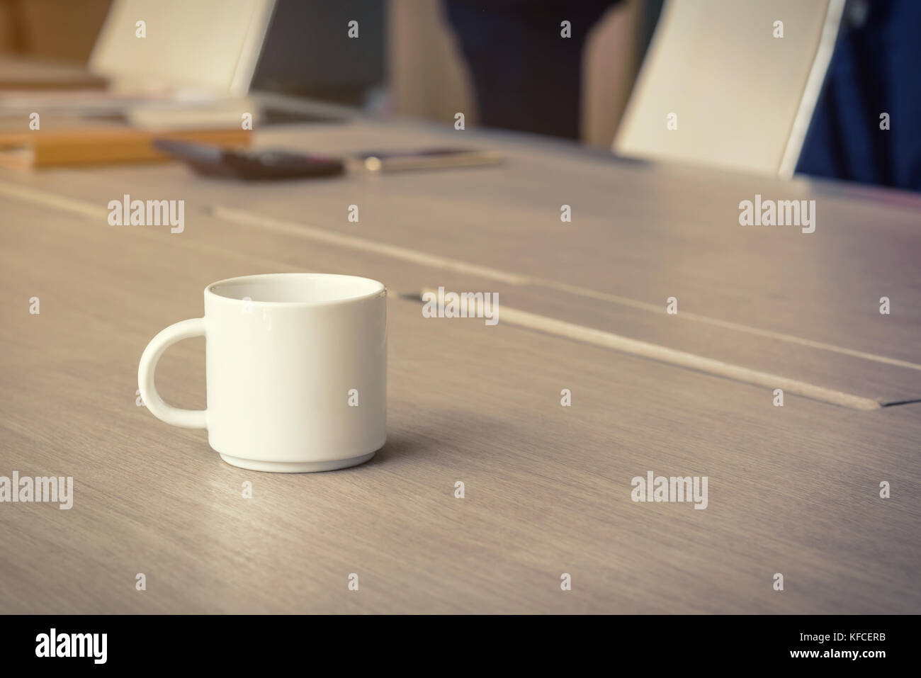 coffee cup on the office desk, business office background concept, selective focus Stock Photo