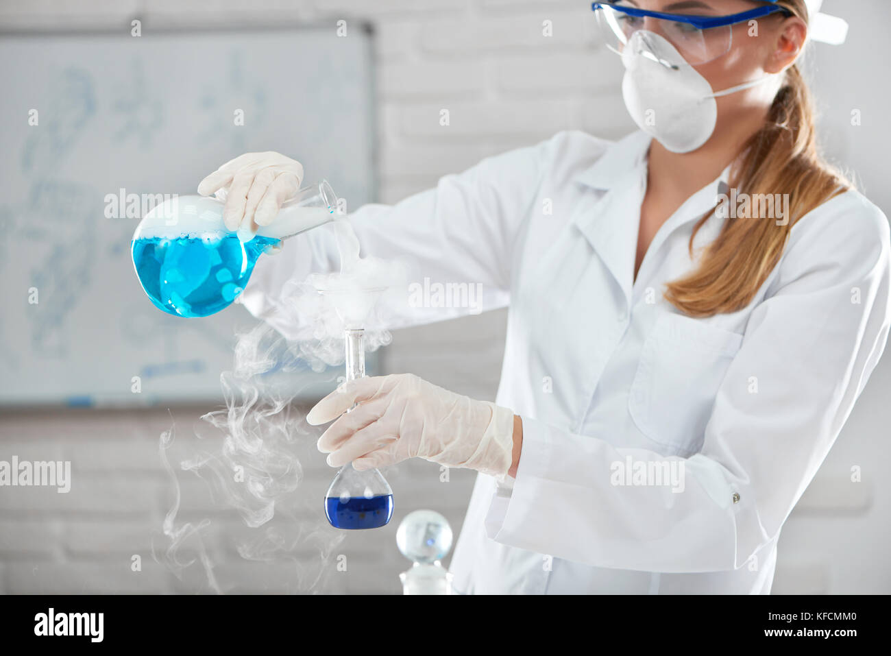 Female chemist working at the laboratory Stock Photo