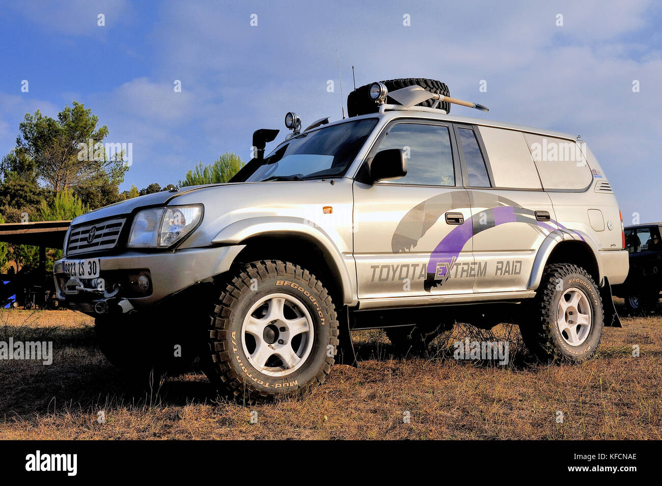 A well-equipped Toyota all-terrain vehicle at sunset Stock Photo - Alamy