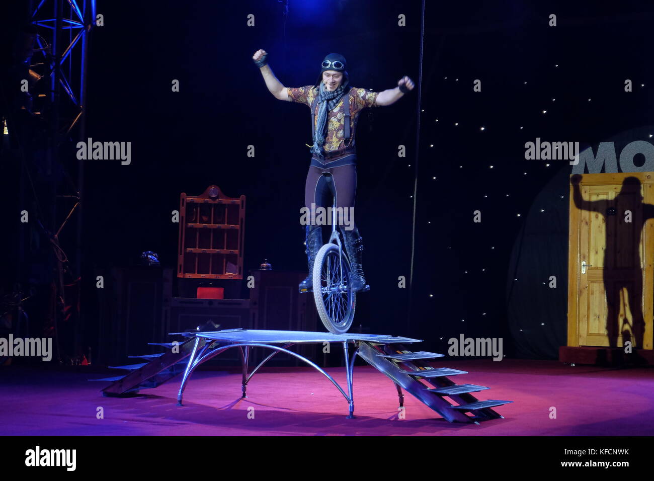 circus performers unicycle Stock Photo Alamy