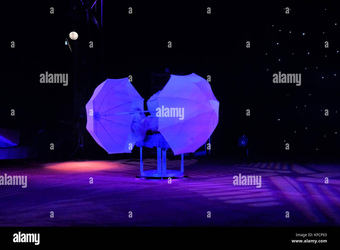 circus performer dancing with umbrella Stock Photo Alamy