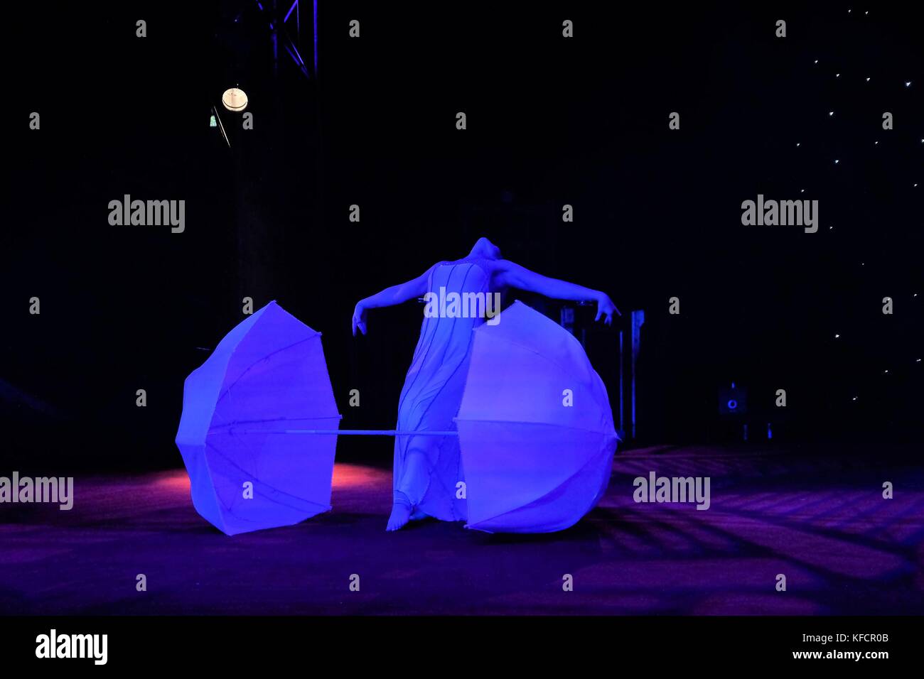 circus performer dancing with umbrella Stock Photo Alamy