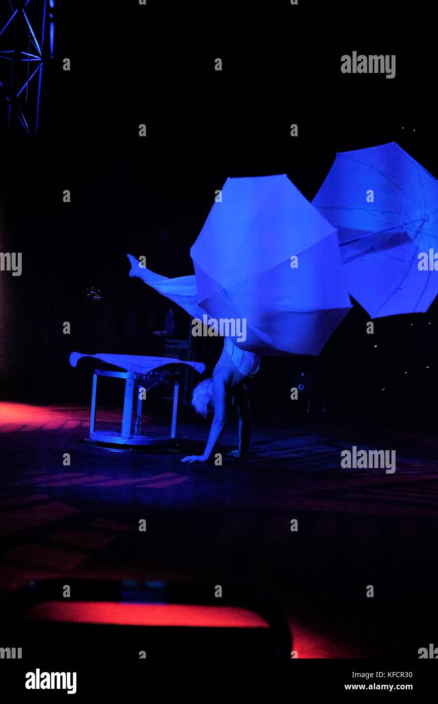 circus performer dancing with umbrella Stock Photo Alamy