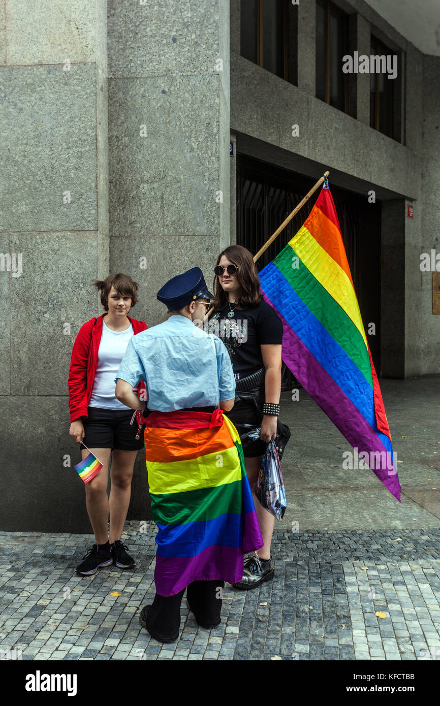 Three young girls from the LGBT community with flags, Prague Pride, Czech Republic Stock Photo