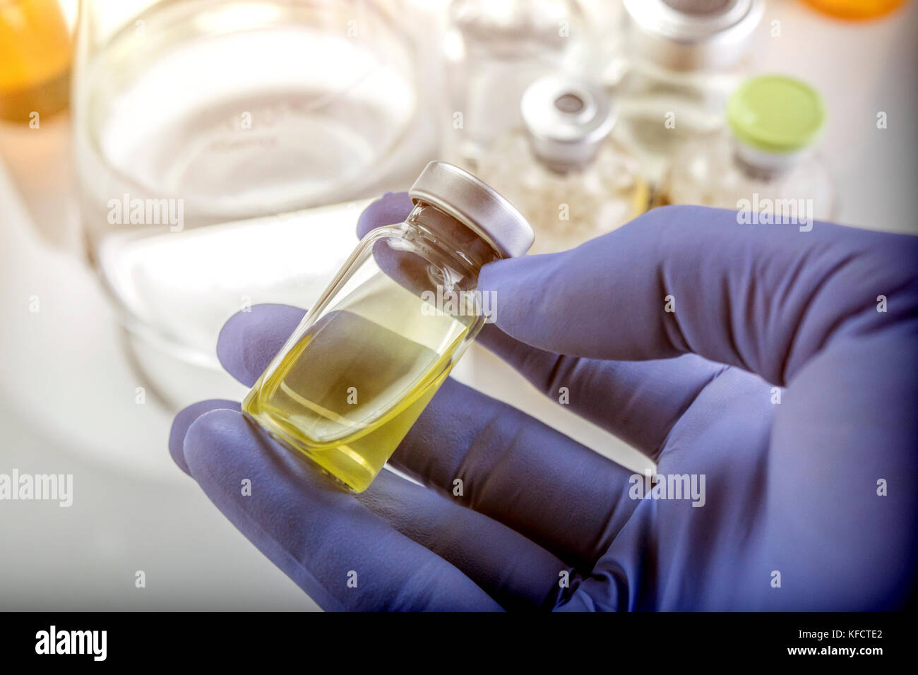 Detail Of Hand Medical Holding A Vial, Conceptual Image Stock Photo
