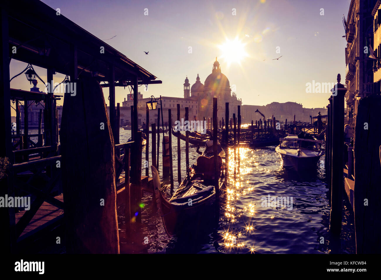 Church of Santa Maria della Salute with boats in front, Venice, Veneto, Italy, Europe Stock Photo