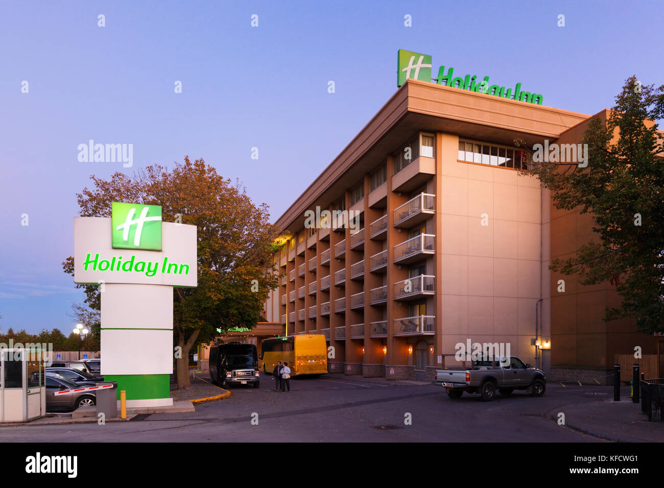 The Holiday Inn hotel at dusk in downtown Kingston, Ontario, Canada. Stock Photo