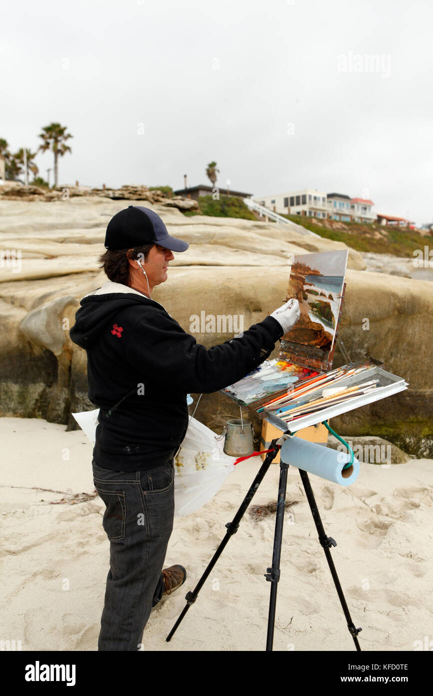 USA, California, San Diego, Paul Gerand paints at Wind and Sea Beach in La Jolla Stock Photo