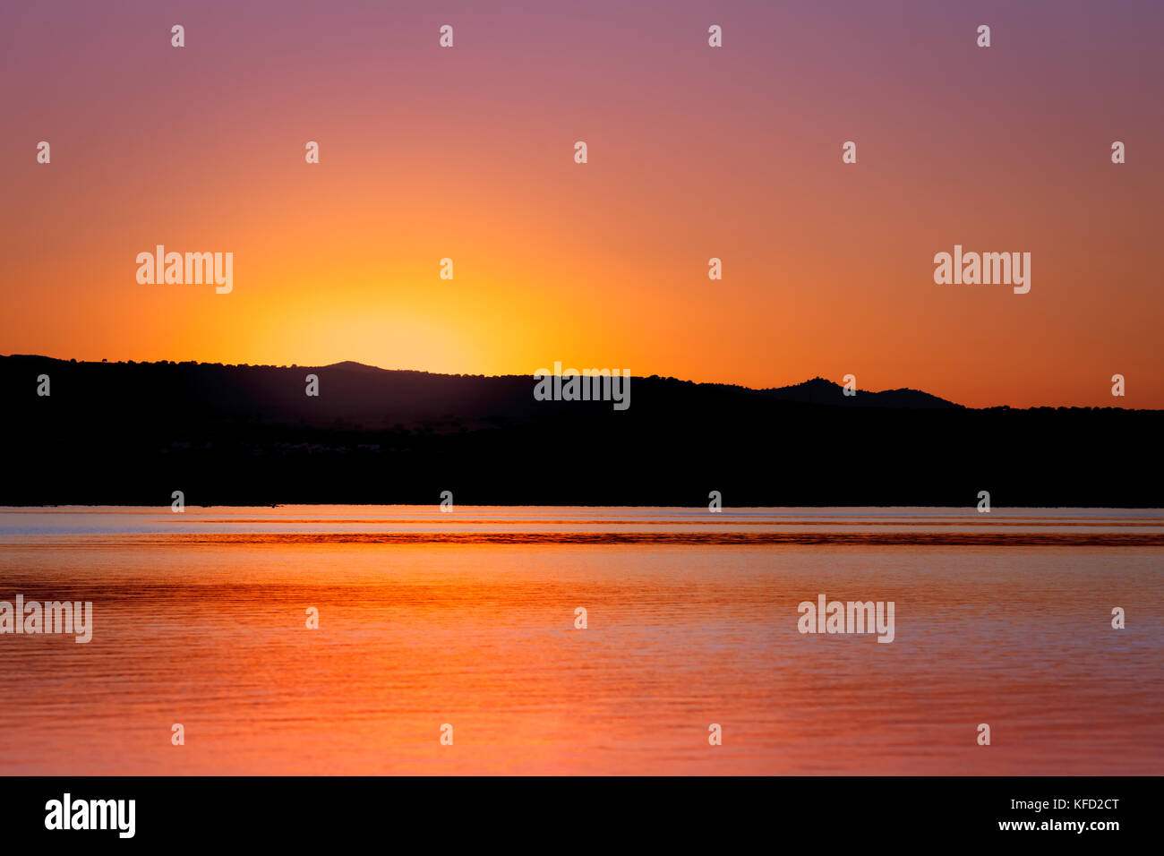 Amazing sunset with golden and black colours Stock Photo - Alamy
