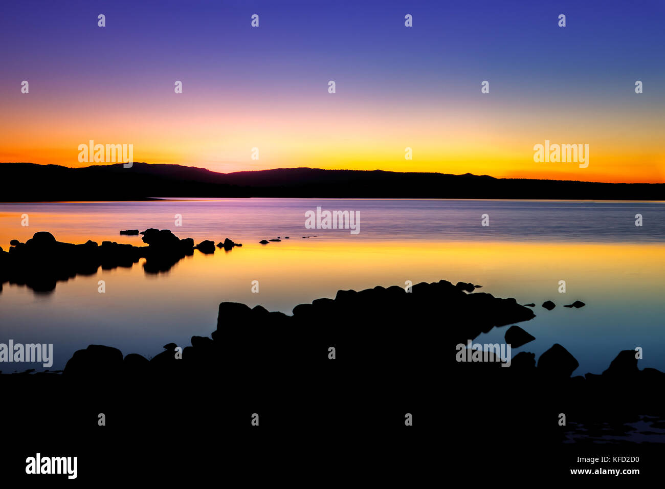 Amazing sunset with golden and black colours Stock Photo - Alamy