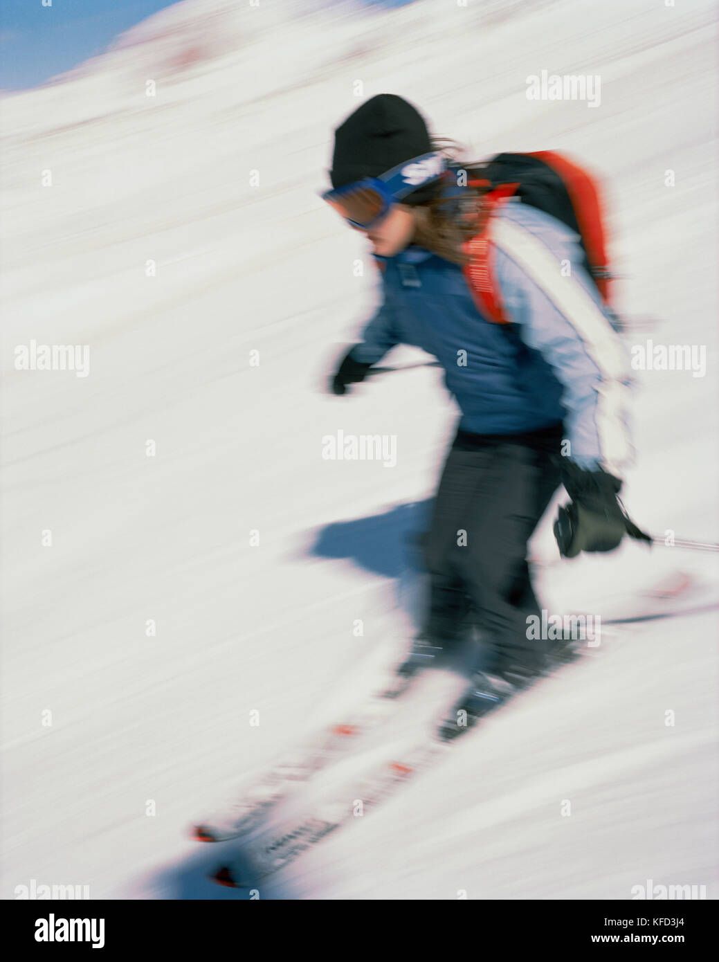 ARGENTINA, Bariloche, blurred motion person skiing on snow capped mountain Stock Photo
