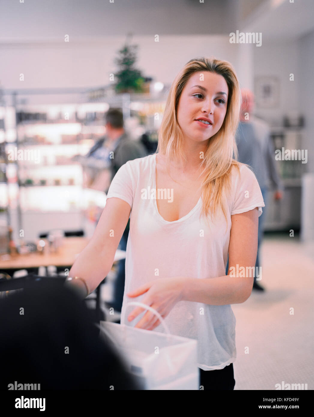 USA, California, Los Angeles, actress Whitney Port buying food at Joan