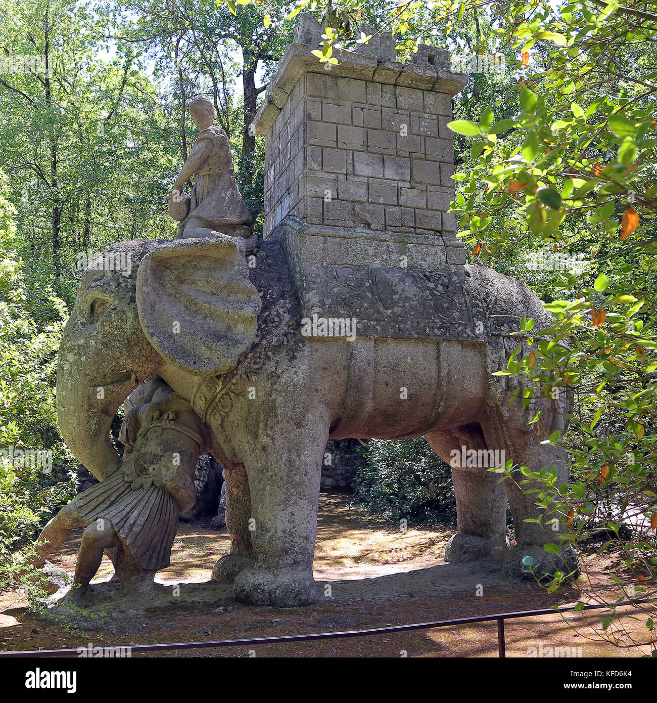 BOMARZO, ITALY - 2 JULY 2017 - The battle elephant statue, with a Roman centurion trapped in the proboscis, is probably the tribute of Bomarzo's lord  Stock Photo