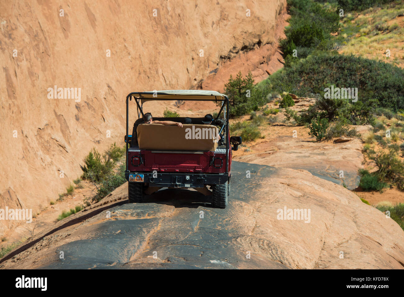 Hummer driving on the, slickrock trail. Moab, Utah, USA Stock Photo