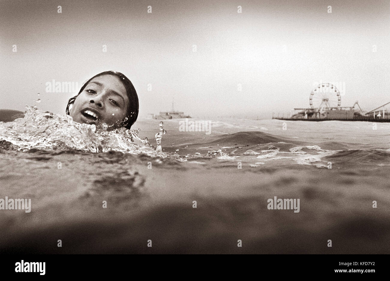 USA, California, portrait of girl lifeguard training, Santa Monica (B&W) Stock Photo