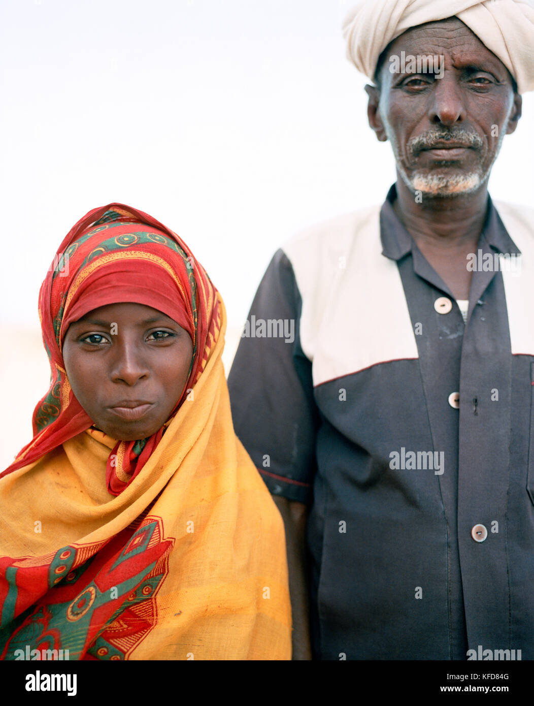 ERITREA, Saroita, portrait of an Afar Mr. Bedri and his daughter in front of their home in the small village of Saroita Stock Photo